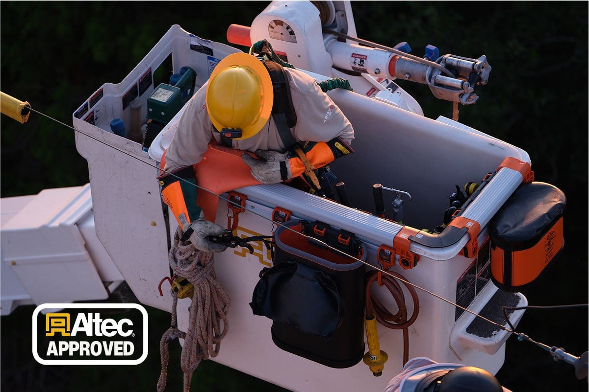 lineman in bucket with the bucket work center
