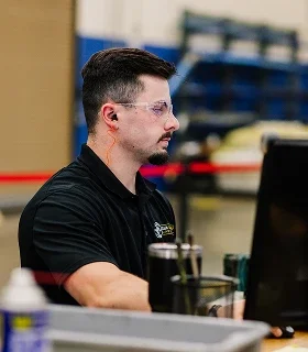 Klein Tools employee working at a desk