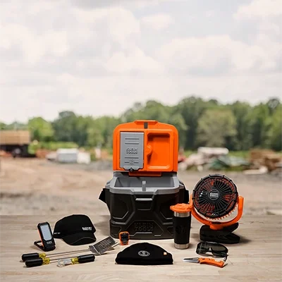 prize items showing a cooler, fan, ball cap, knit hat, sunglasses, flashlight, and other items
